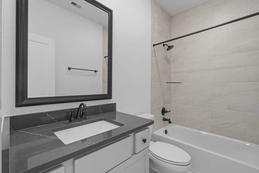Representative furnished interior of a home built from the Riverdale by Chesmar Homes in Bridgeland, Elgin (Image 7).