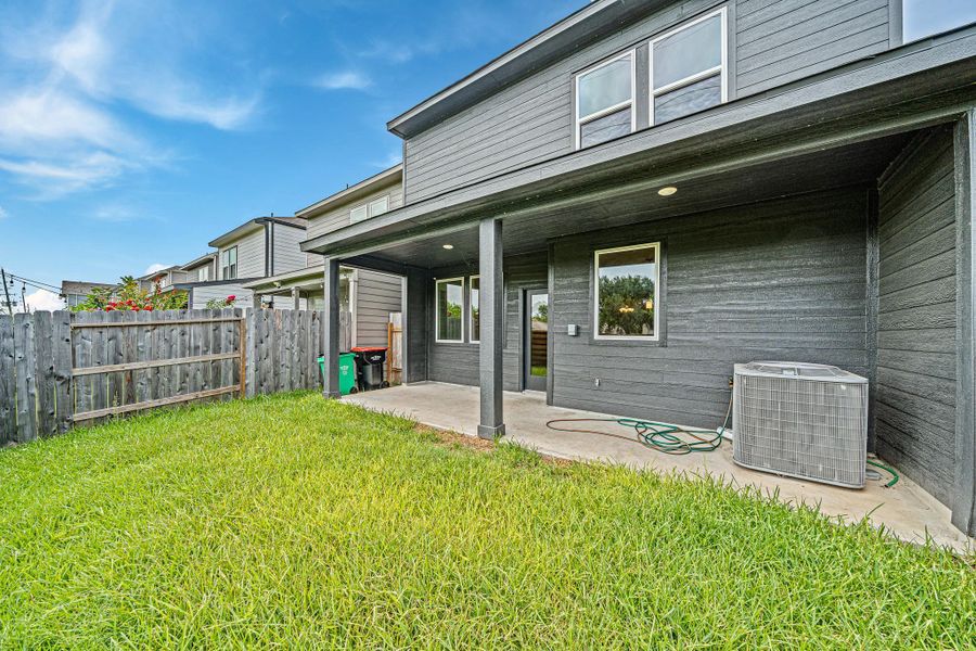 Exterior details and patio area of a home in , Houston (Image 3).