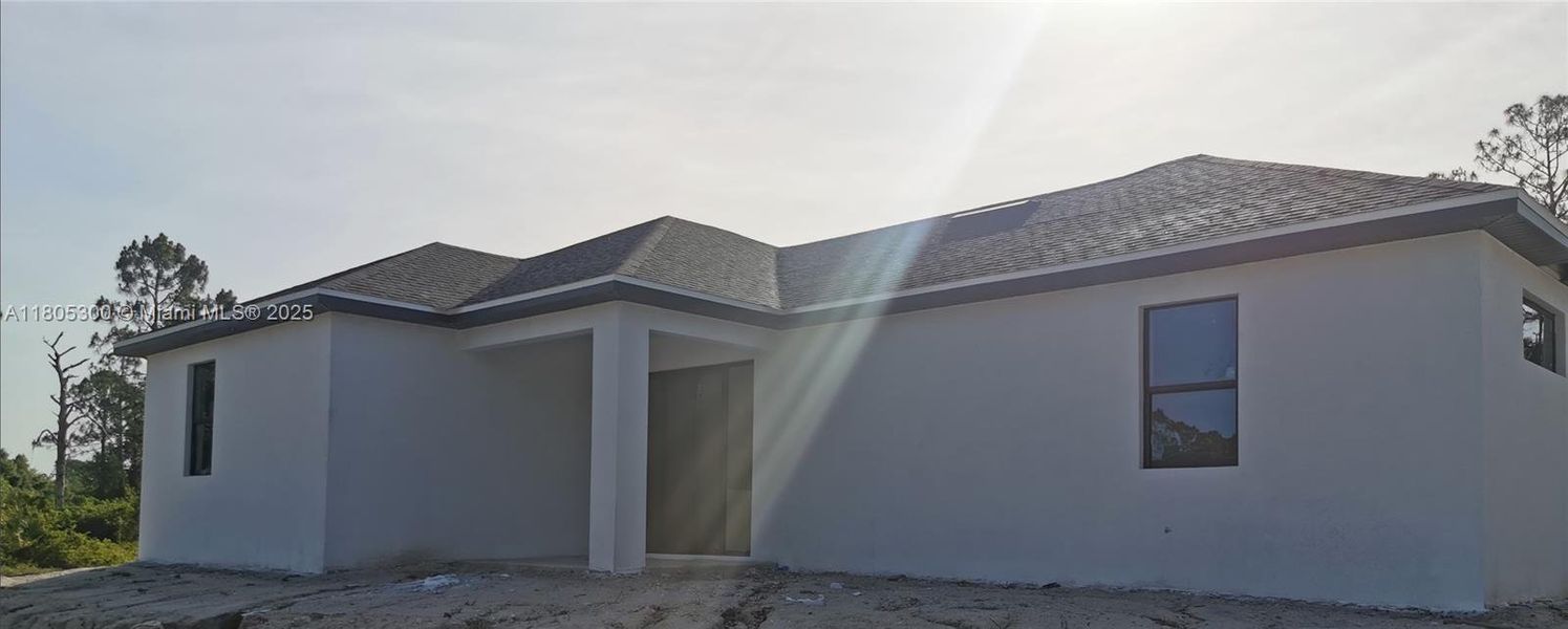 Exterior details and patio area of a home in , Lehigh Acres (Image 3).