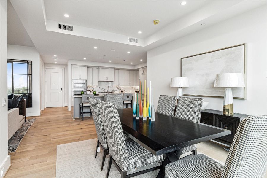 Alternate view of the formal dining. Photos are of a similar unit with the same floor plan