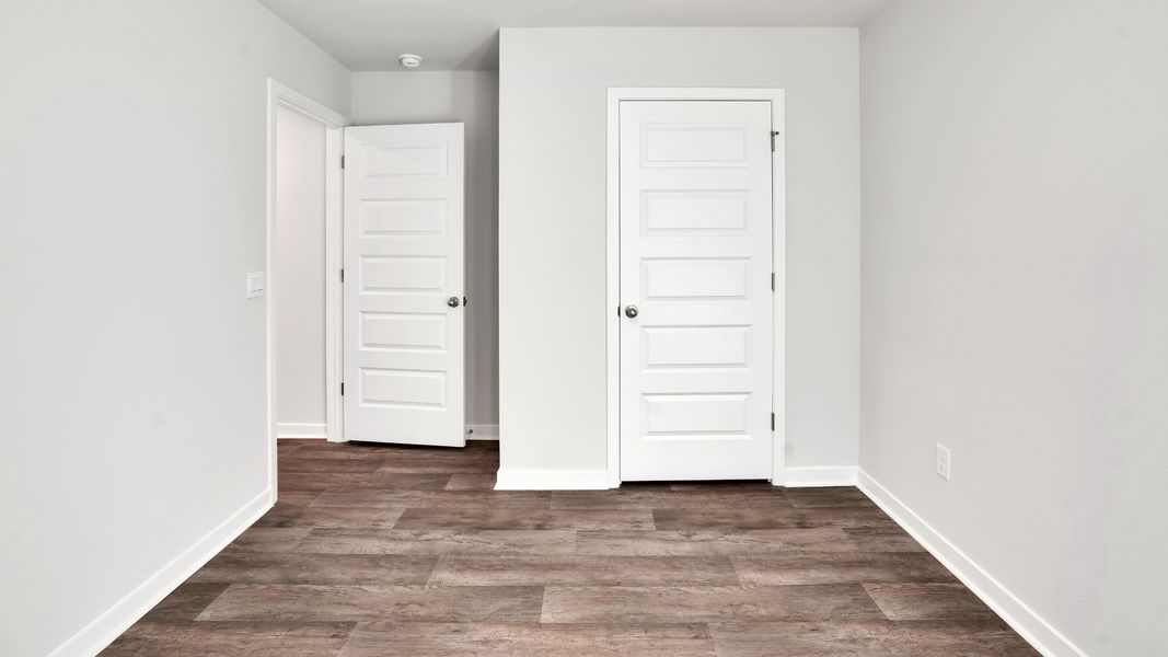 Spacious, unfurnished interior of a new home in Lockwood Landing, Supply (Image 21). Spacious, unfurnished interior of a new home in Lockwood Landing, Supply (Image 21).