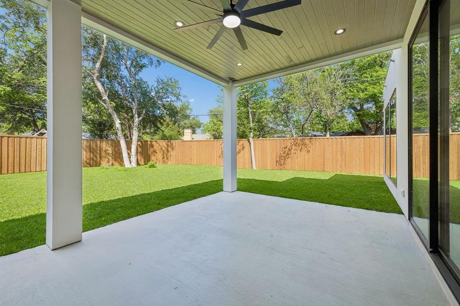 Large covered patio is prepped for motorized mosquito screens