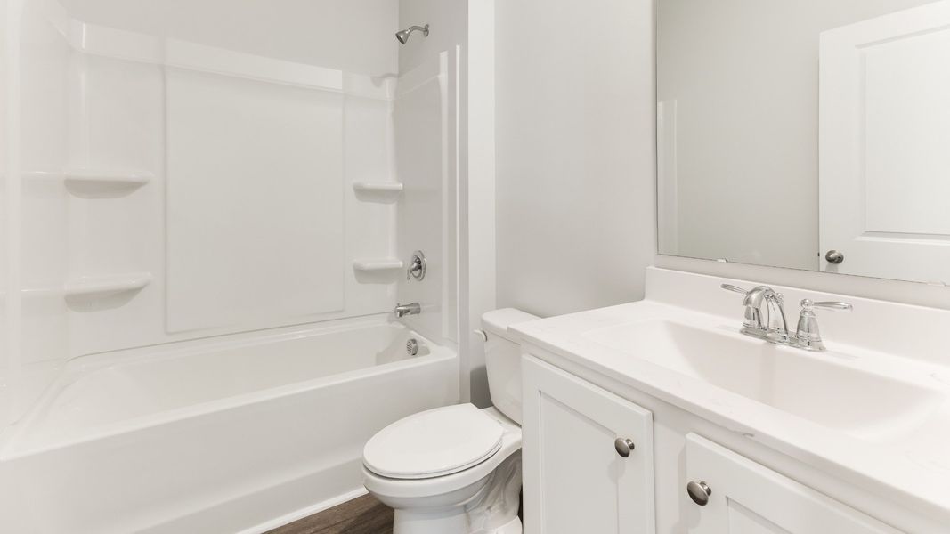 Representative furnished interior of a home built from the HAYDEN by D.R. Horton in Sidbury Station, Castle Hayne (Image 9).
