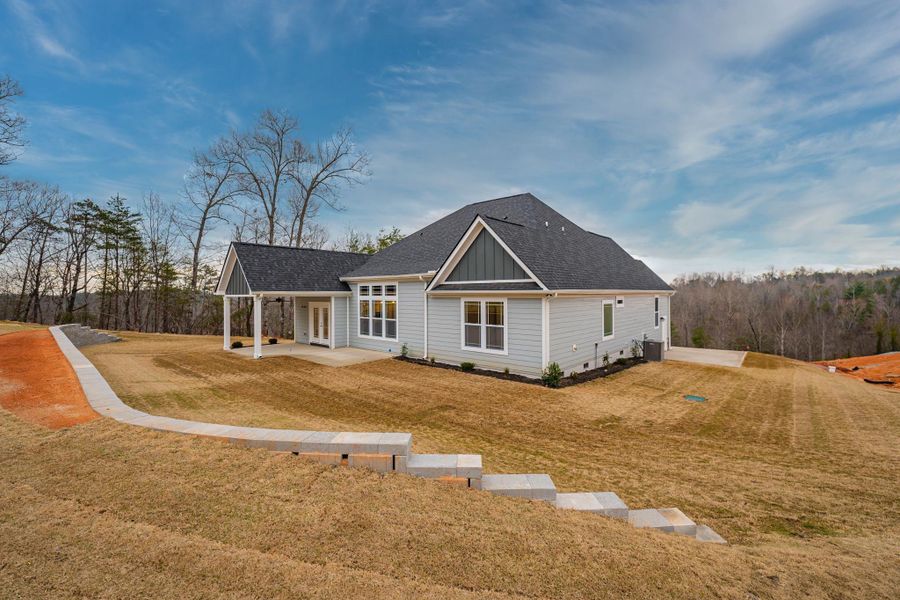 Representative exterior details of a home built from the Roosevelt Elite by Enchanted Homes in Pointe Summit, Slater-Marietta (Image 3).