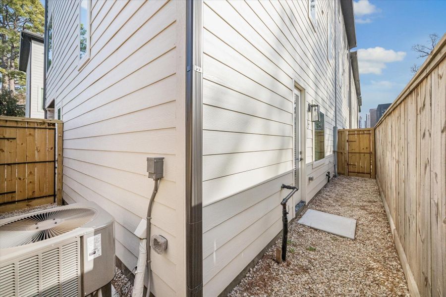 A small gravel yard designed for minimal maintenance and effortless care.