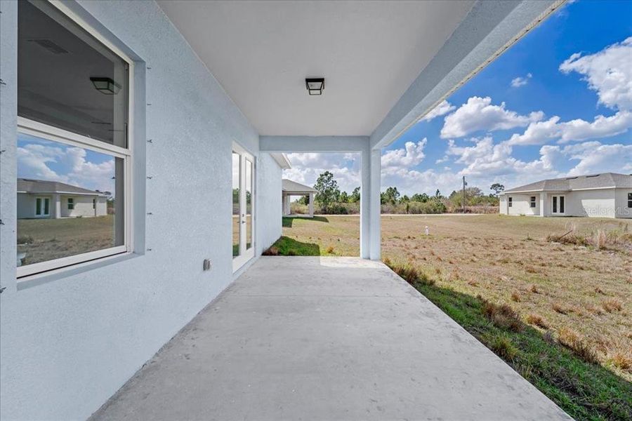 Exterior details and patio area of a home in , Lehigh Acres (Image 2). Exterior details and patio area of a home in , Lehigh Acres (Image 2).