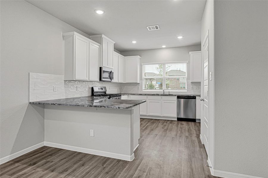 Furnished interior view inside a new home in Rollingbrook Estates, Baytown (Image 10).