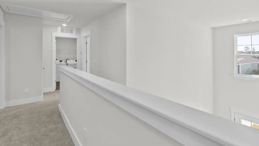 Spacious, unfurnished interior of a new home in The Highlands at Cedar Hill Landing, Navassa (Image 22).
