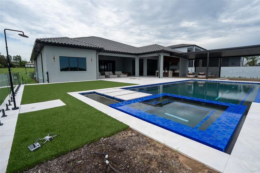 Exterior details and patio area of a home in , Montverde (Image 24).