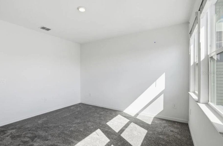 Spacious, unfurnished interior of a new home in Harvest at Ovation, Winter Garden (Image 23). Spacious, unfurnished interior of a new home in Harvest at Ovation, Winter Garden (Image 23).