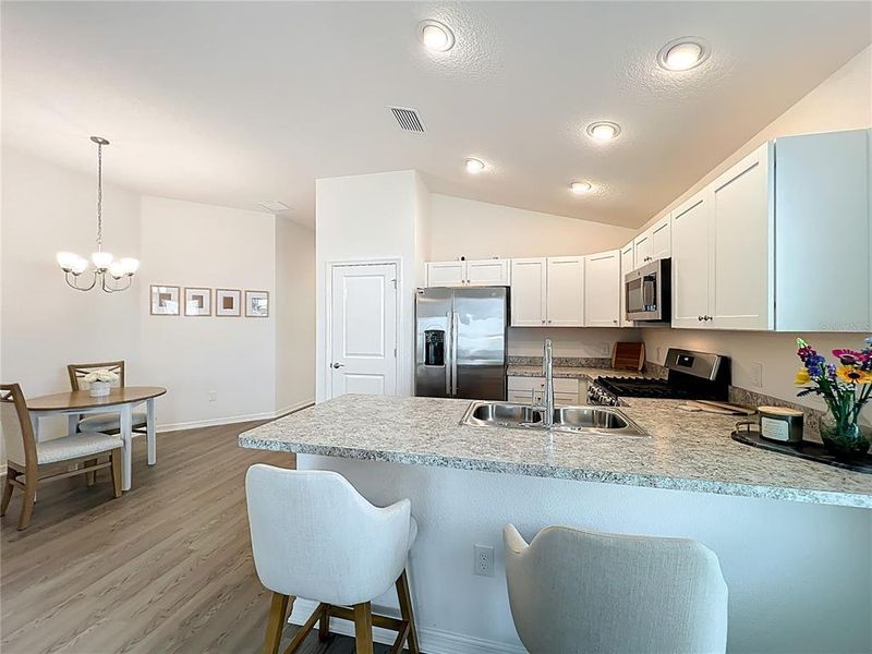 Furnished interior view inside a new home in , The Villages (Image 9).