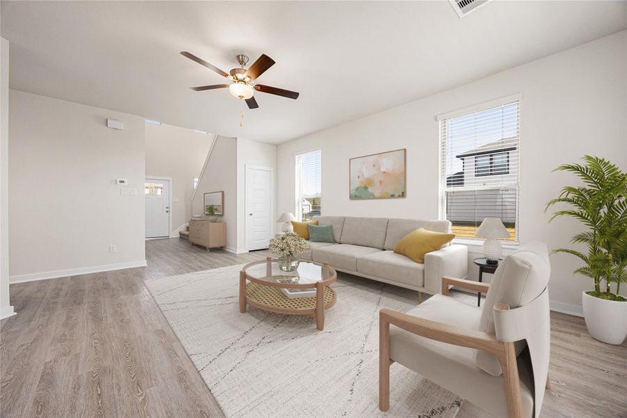 The open and airy living space is filled with natural light, highlighting a clean, modern design. Neutral tones and recessed lighting create a bright, welcoming atmosphere, with a seamless flow to the kitchen and dining areas. Perfect for everyday living and entertaining. The open and airy living space is filled with natural light, highlighting a clean, modern design. Neutral tones and recessed lighting create a bright, welcoming atmosphere, with a seamless flow to the kitchen and dining areas. Perfect for everyday living and entertaining.