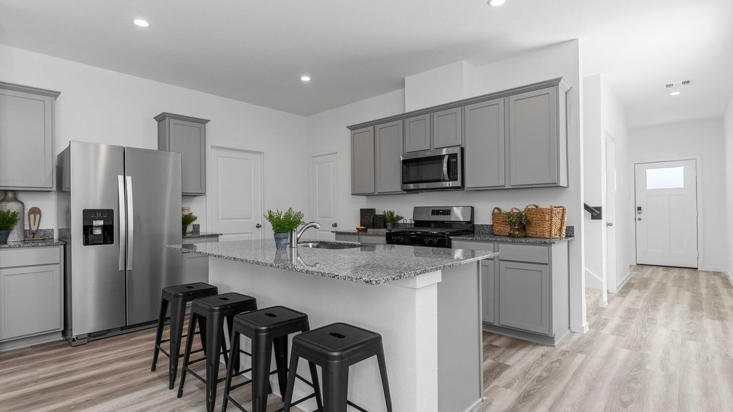 Representative furnished interior of a home built from the FLORENCE by D.R. Horton in Lakes at Westland Ranch, League City (Image 4).