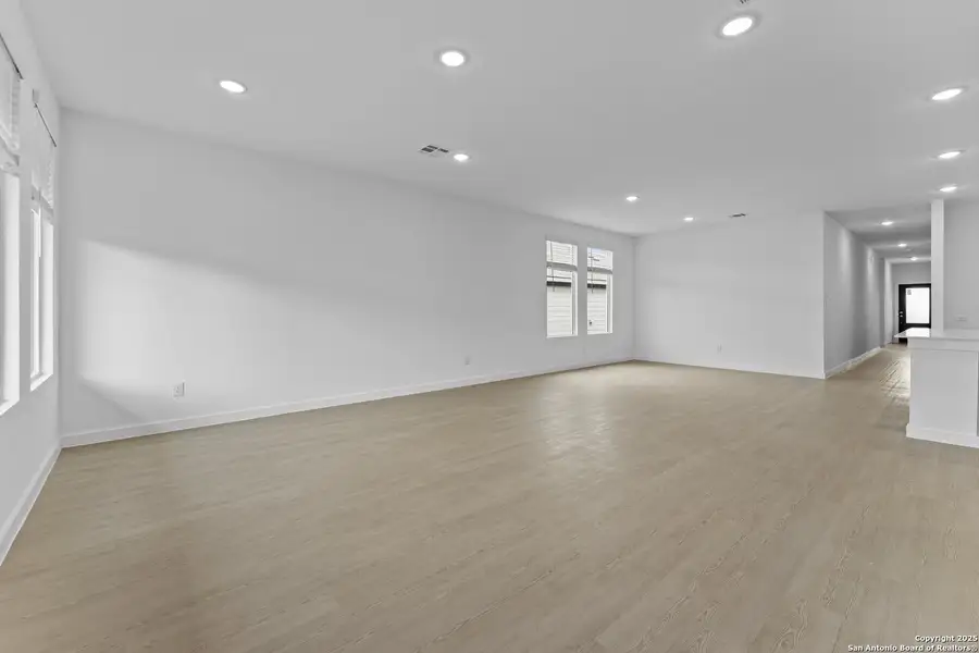 Spacious, unfurnished interior of a new home in Waterwheel: Coastline Collection, San Antonio (Image 9).