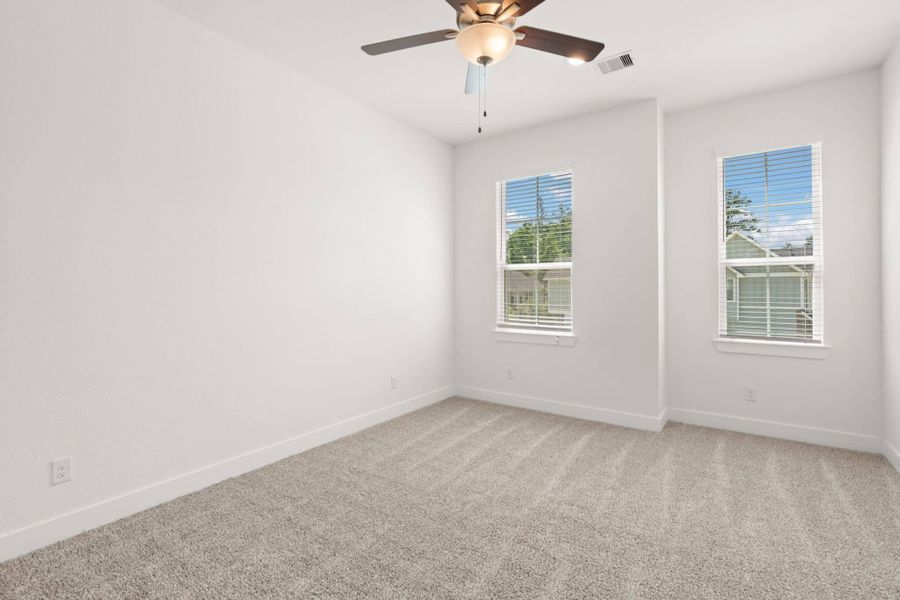 Spacious, unfurnished interior of a new home in Sienna, Missouri City (Image 12).