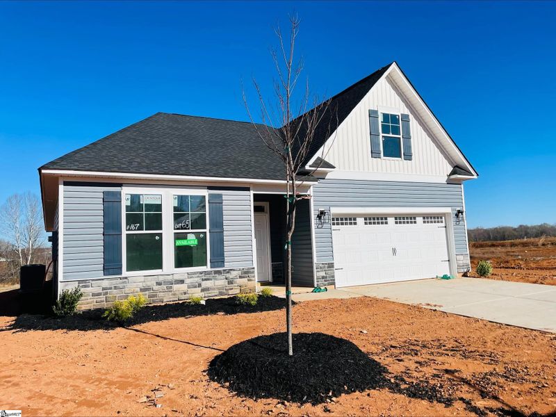 Front exterior of a new home in Lynbrook, Boiling Springs, SC, highlighting curb appeal (Image 2). Front exterior of a new home in Lynbrook, Boiling Springs, SC, highlighting curb appeal (Image 2).