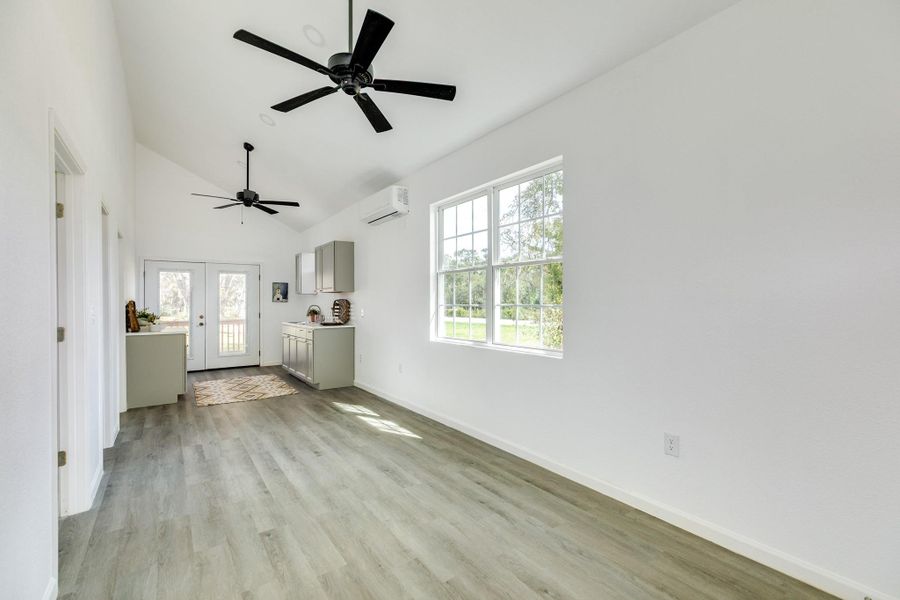 Bright and cozy living space with natural light and an open layout.
