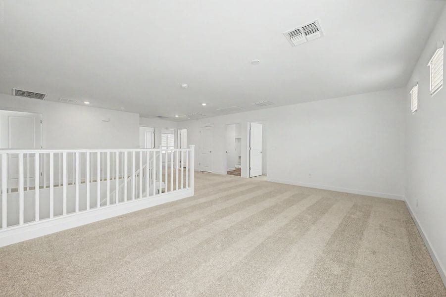 Spacious, unfurnished interior of a new home in Bentridge, Buckeye (Image 11). Spacious, unfurnished interior of a new home in Bentridge, Buckeye (Image 11).