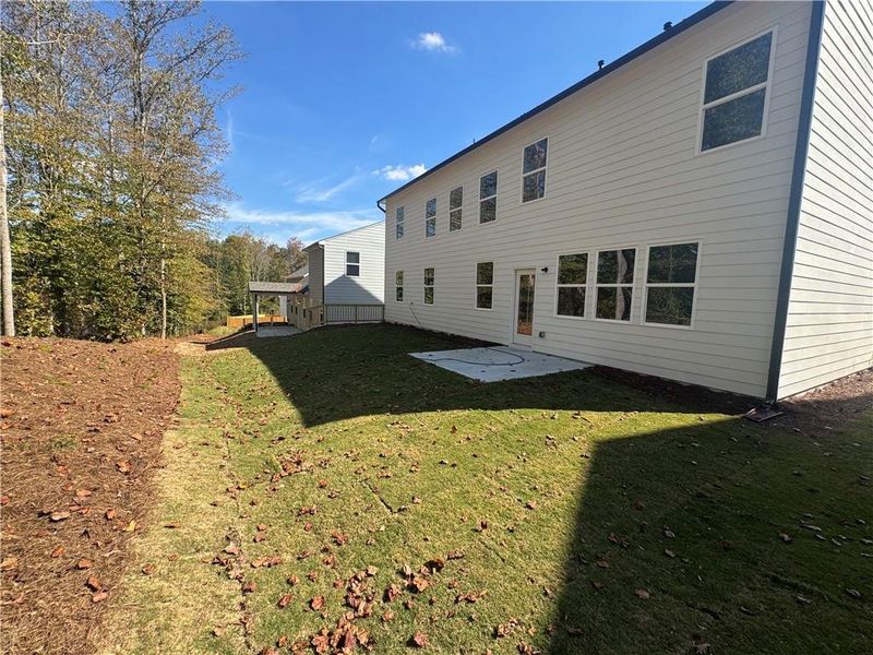 Exterior details and patio area of a home in The Reserve at Willow Oaks, Canton (Image 3). Exterior details and patio area of a home in The Reserve at Willow Oaks, Canton (Image 3).