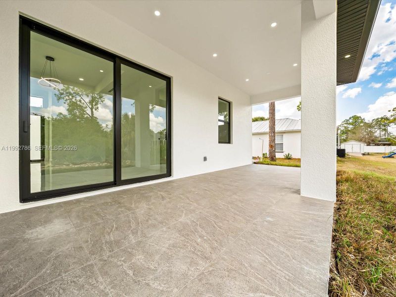 Exterior details and patio area of a home in , Lehigh Acres (Image 4).