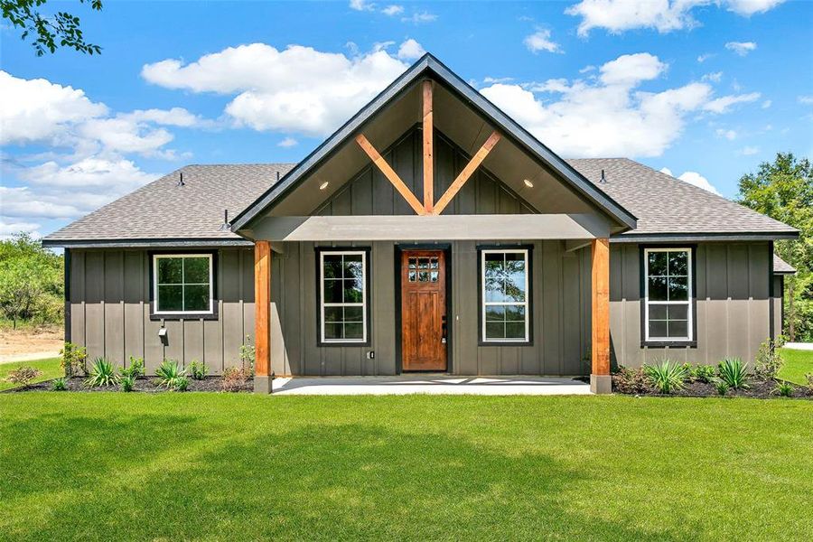 Front exterior of a new home in , Ennis, TX, highlighting curb appeal (Image 1). Front exterior of a new home in , Ennis, TX, highlighting curb appeal (Image 1).