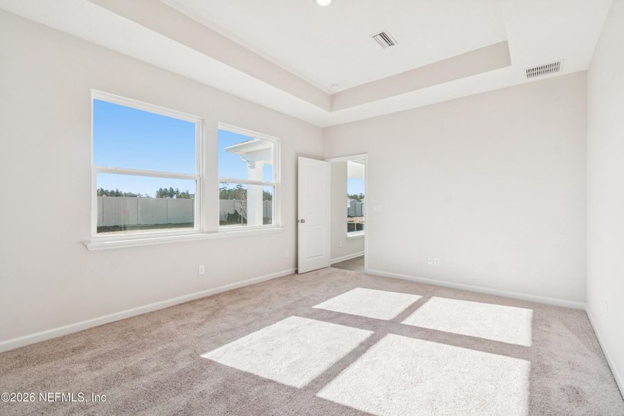 Spacious, unfurnished interior of a new home in Tributary 50', Yulee (Image 24).