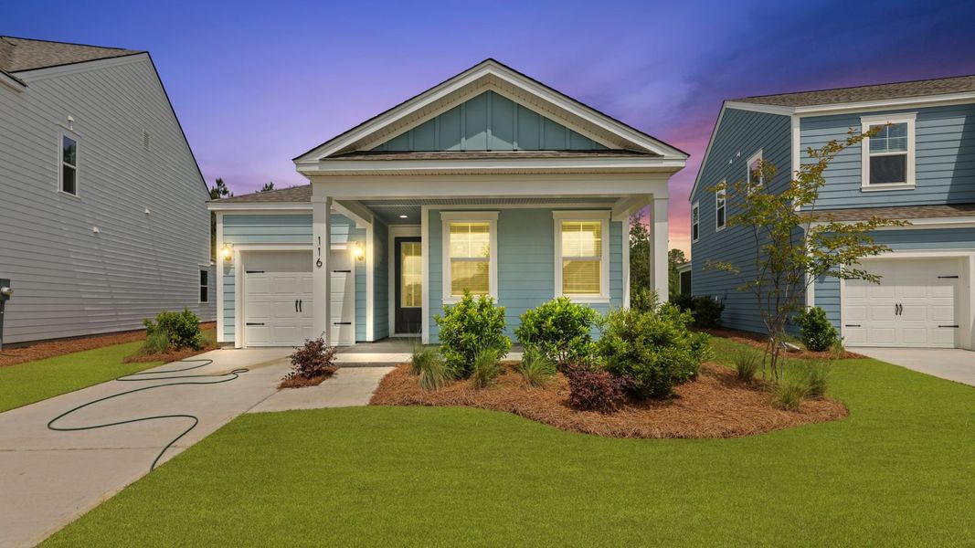 Front exterior of a new home in Sheep Island, Summerville, SC, highlighting curb appeal (Image 1).