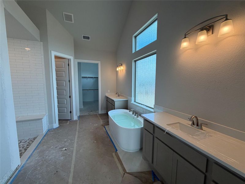 Primary Bath retreat with dual vanities & soaking tub
