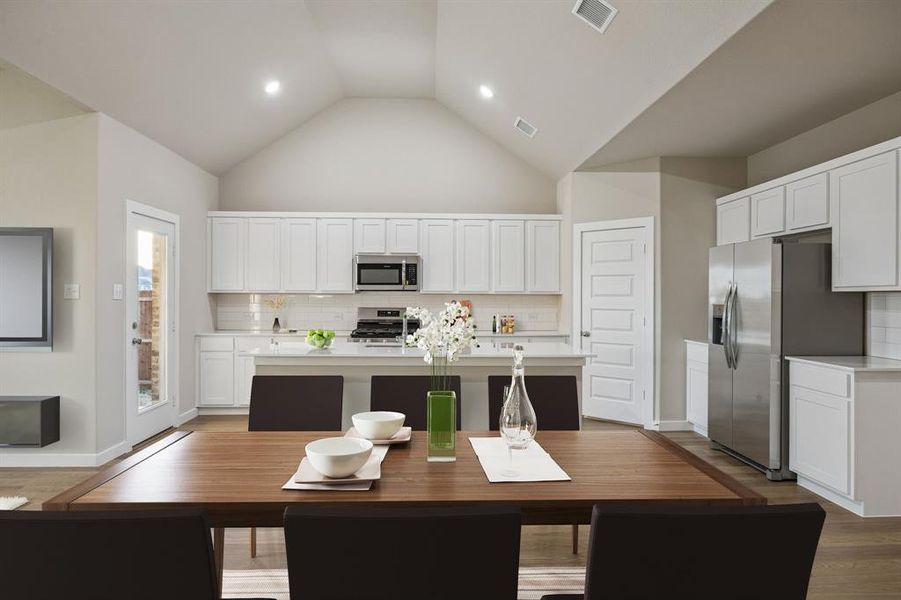 Kitchen in the Wimbledon home plan by Trophy Signature Homes – REPRESENTATIVE PHOTO Kitchen in the Wimbledon home plan by Trophy Signature Homes – REPRESENTATIVE PHOTO