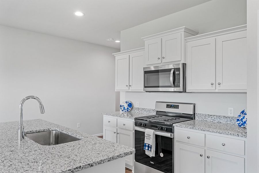 Representative furnished interior of a home built from the TEXAS CALI by D.R. Horton in Faculty Row, Abilene (Image 10).