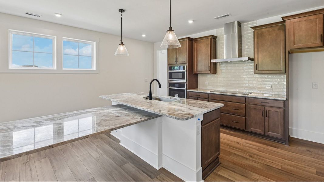 The Awaken Plan by DRB Elevate in Brook Run, Fort Mill SC - Kitchen with grand island