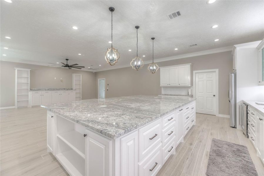 Kitchen with huge granite countertops and plenty of cabinets with ample lighting(Building A) Kitchen with huge granite countertops and plenty of cabinets with ample lighting(Building A)