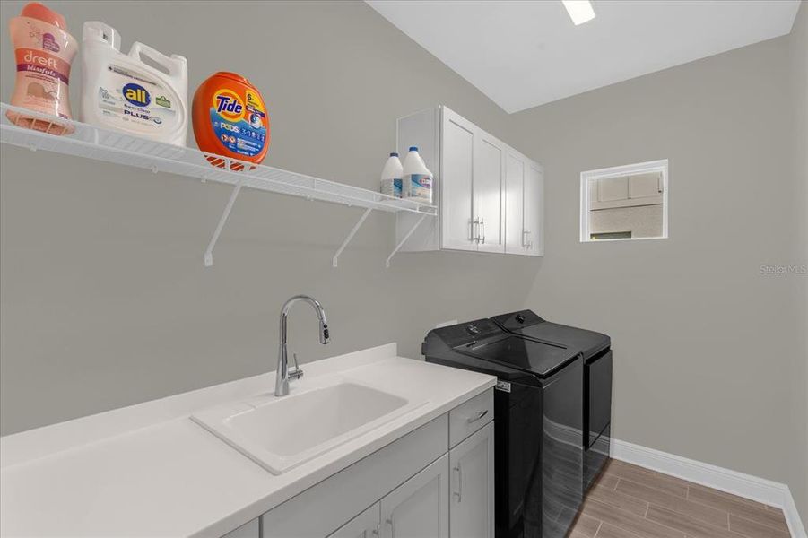 Furnished interior view inside a new home in Canoe Creek, Parrish (Image 27).