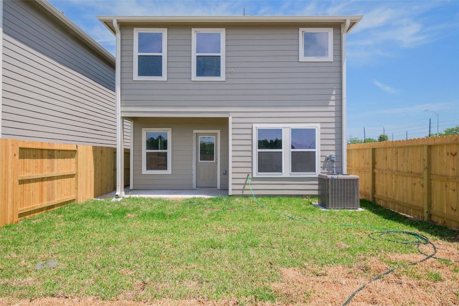 Exterior details and patio area of a home in , Houston (Image 3). Exterior details and patio area of a home in , Houston (Image 3).