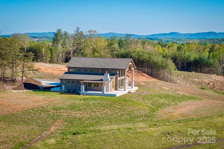 Front exterior of a new home in , Lenoir, NC, highlighting curb appeal (Image 16).