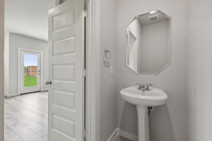 Bathroom in the Hickory home plan by Trophy Signature Homes – REPRESENTATIVE PHOTO