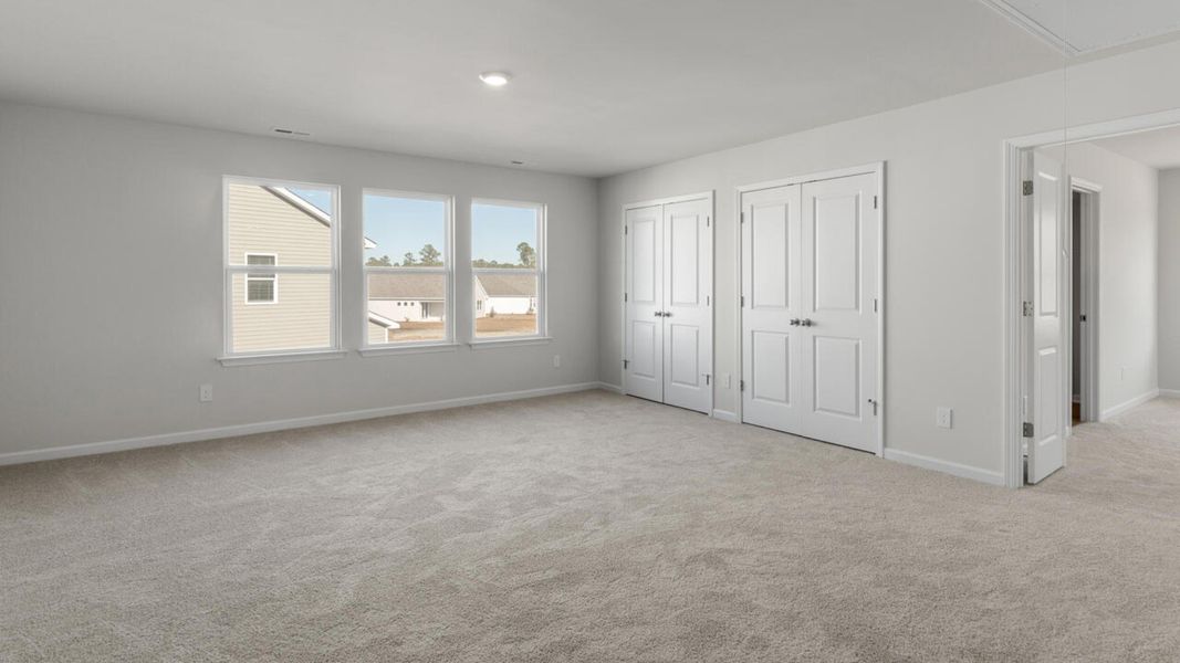 Representative unfurnished interior of a home built from the HARBOR OAK by D.R. Horton in Indigo Preserve, Leland (Image 33).