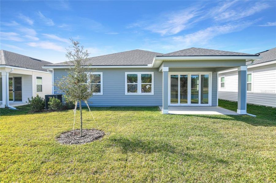 Exterior details and patio area of a home in Seminole Palms, Palm Coast (Image 19).