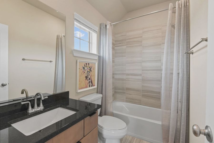 Representative furnished interior of a home built from the Fairview by Chesmar Homes in Sienna Courtyard, Missouri City (Image 10).