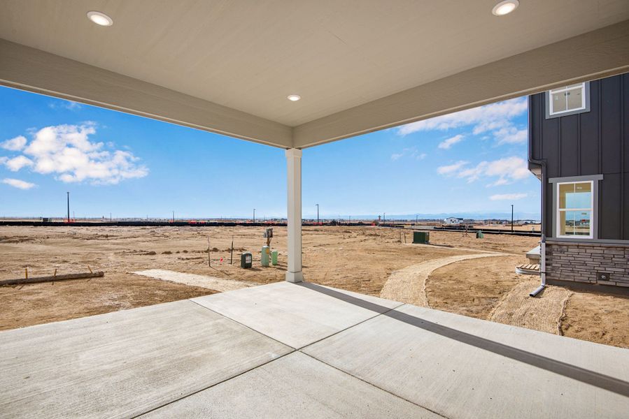 Exterior details and patio area of a home in The Aurora Highlands, Aurora (Image 21).