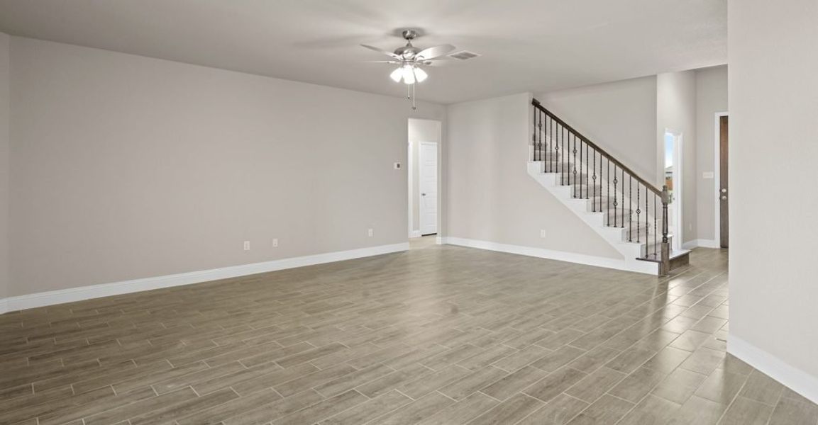 Representative exterior photo of a completed home built from the Donnington by Impression Homes in Still Water Lake, Godley, TX (Image 12).