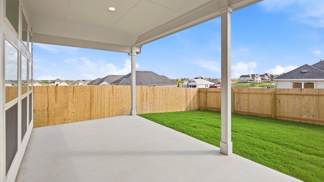 Exterior details and patio area of a home in Carillon, Manor (Image 3).