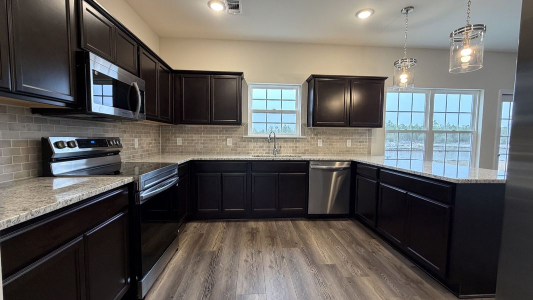 Furnished interior view inside a new home in Grand Reserve, Hinesville (Image 6).