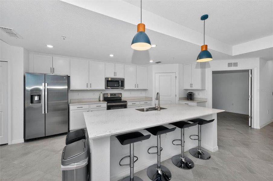 Furnished interior view inside a new home in Wellen Park Golf & Country Club, Venice (Image 7).