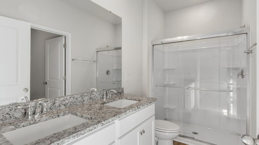 Representative furnished interior of a home built from the PERRY by D.R. Horton in The Cottages at Blake Farm, Wilmington (Image 13).