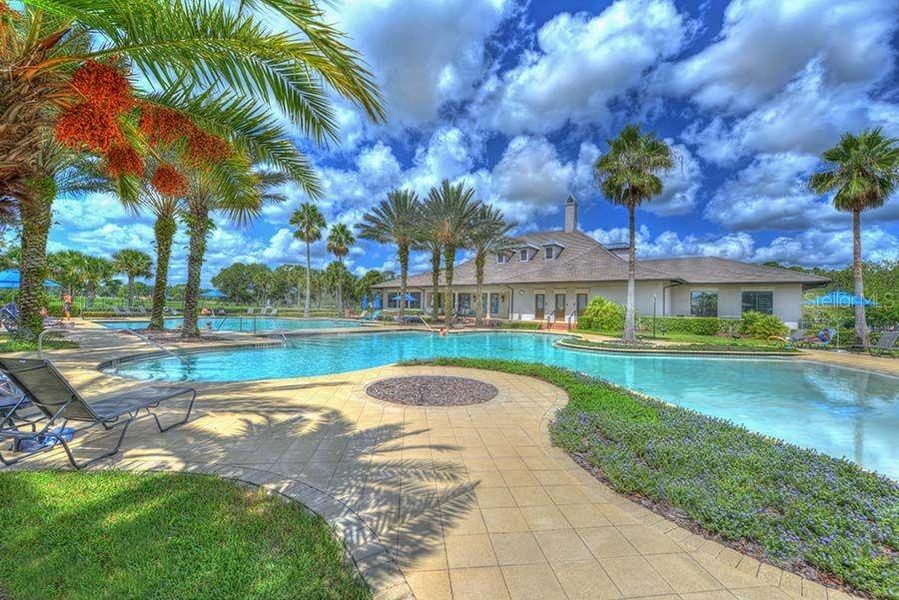 Front exterior of a new home in Westlake Townhomes, Ormond Beach, FL, highlighting curb appeal (Image 16).
