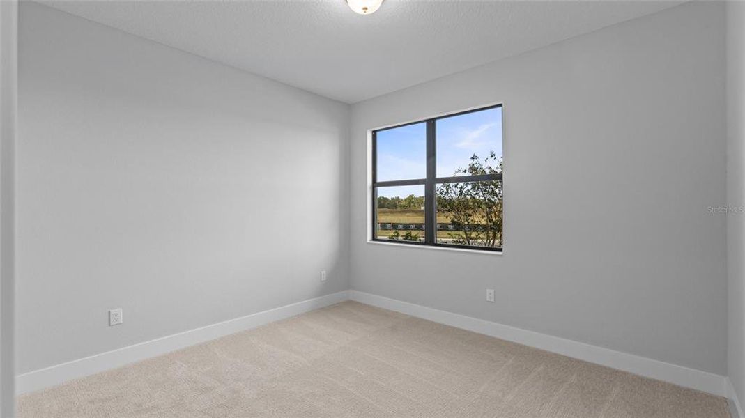 Spacious, unfurnished interior of a new home in Woodland Preserve, Parrish (Image 18).