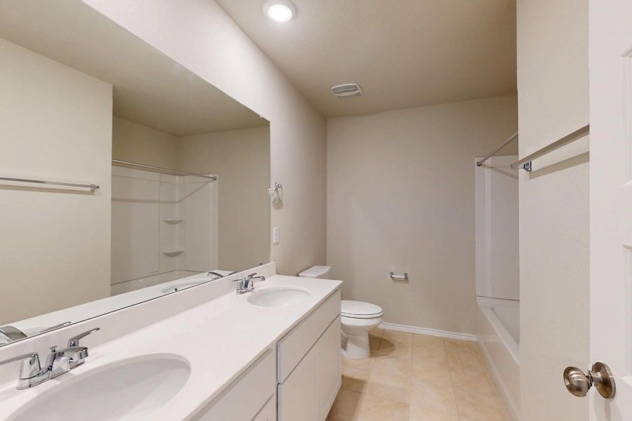 Furnished interior view inside a new home in Carillon, Manor (Image 11).
