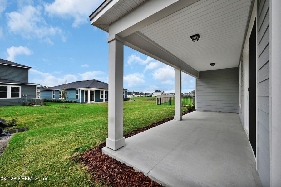 Exterior details and patio area of a home in Hyland Trail, Green Cove Springs (Image 3).