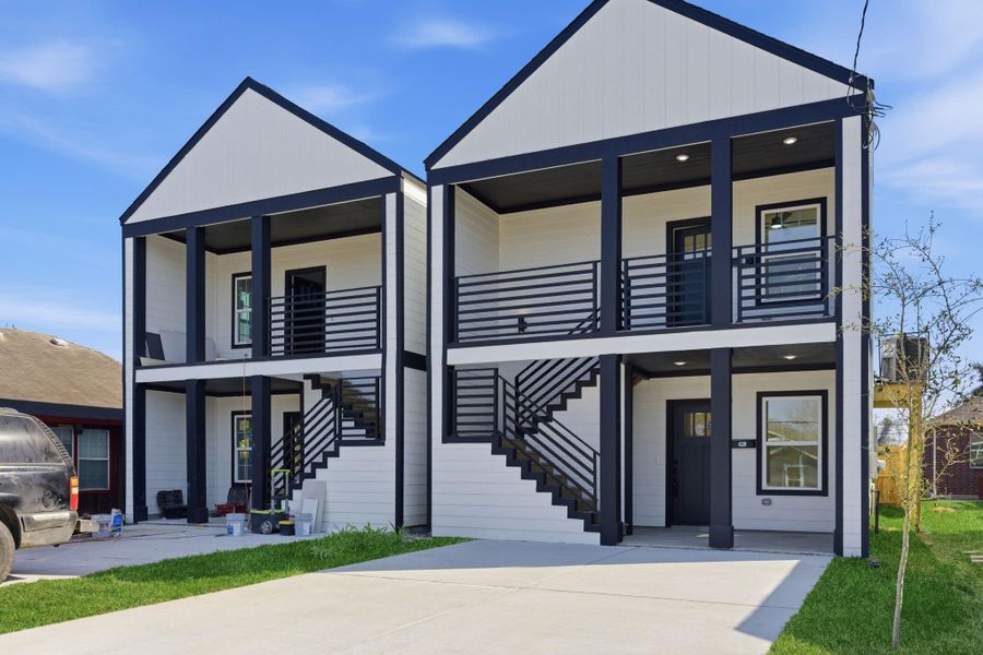 Front exterior of a new home in , Houston, TX, highlighting curb appeal (Image 26).